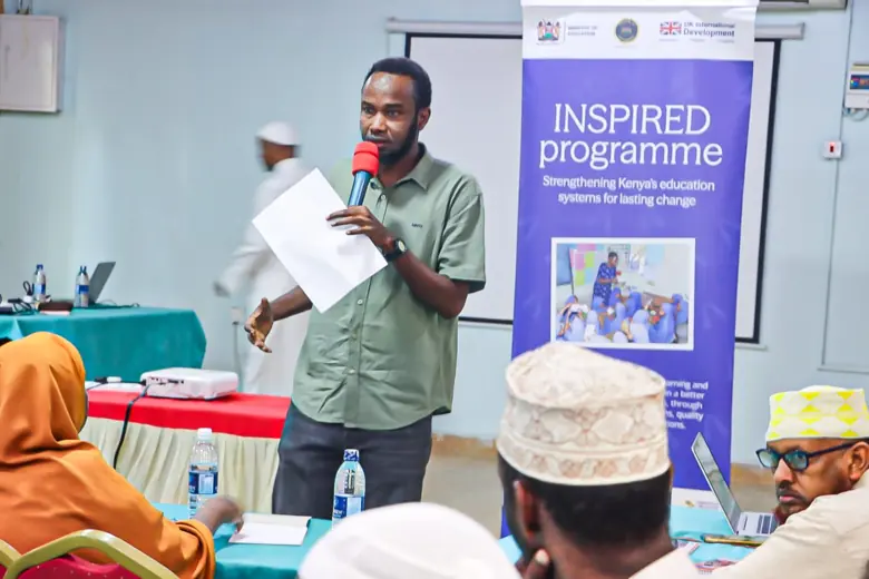 A participant speaks at an INSPIRED programme session